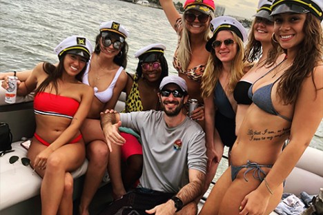 a group of people sitting posing for the camera