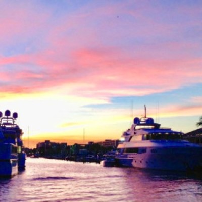 a boat is docked next to a body of water