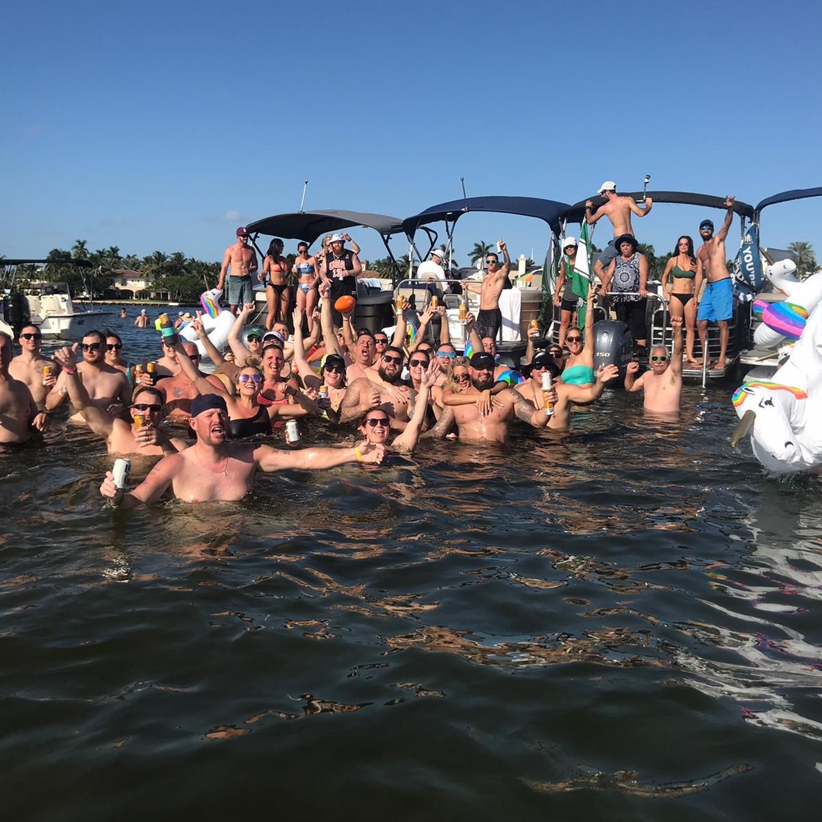 a group of people swimming in the water
