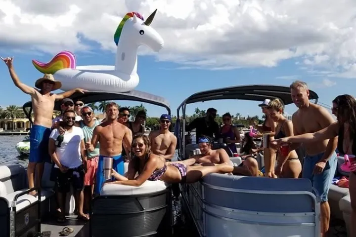 a group of people on a boat in the water