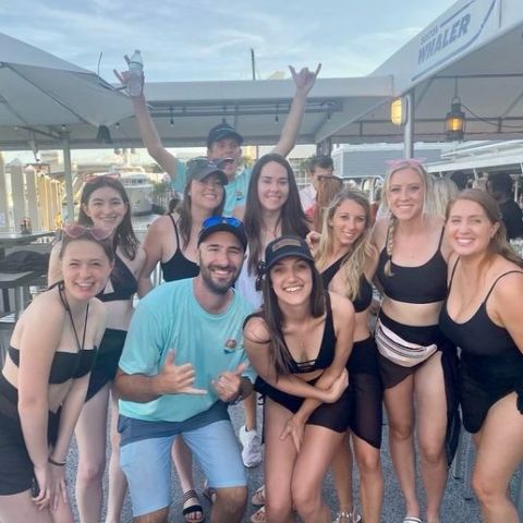 a group of people posing for a photo