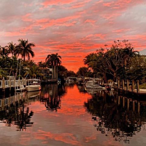 a sunset over a body of water